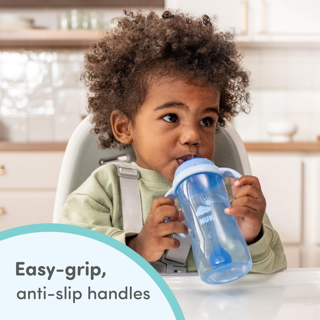 NUK spill proof blue sippy cup highlighting the ergonomic anti slip handles