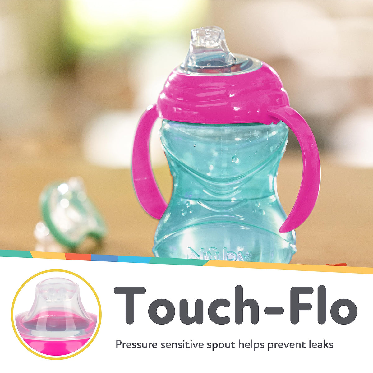 Demonstration of the Clik-It locking lid mechanism on the Nuby trainer cup to prevent accidental leaks.