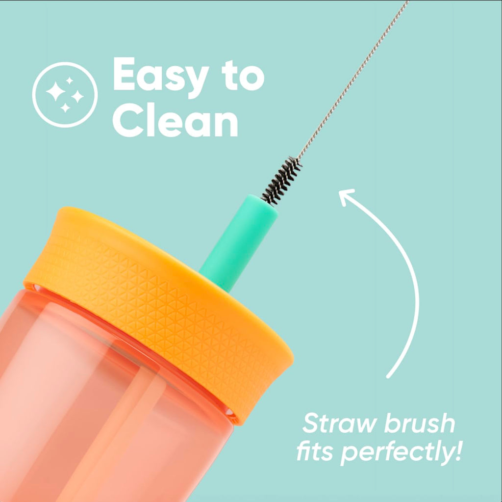 BPA-free plastic travel tumbler for toddlers placed in a stroller cup holder.