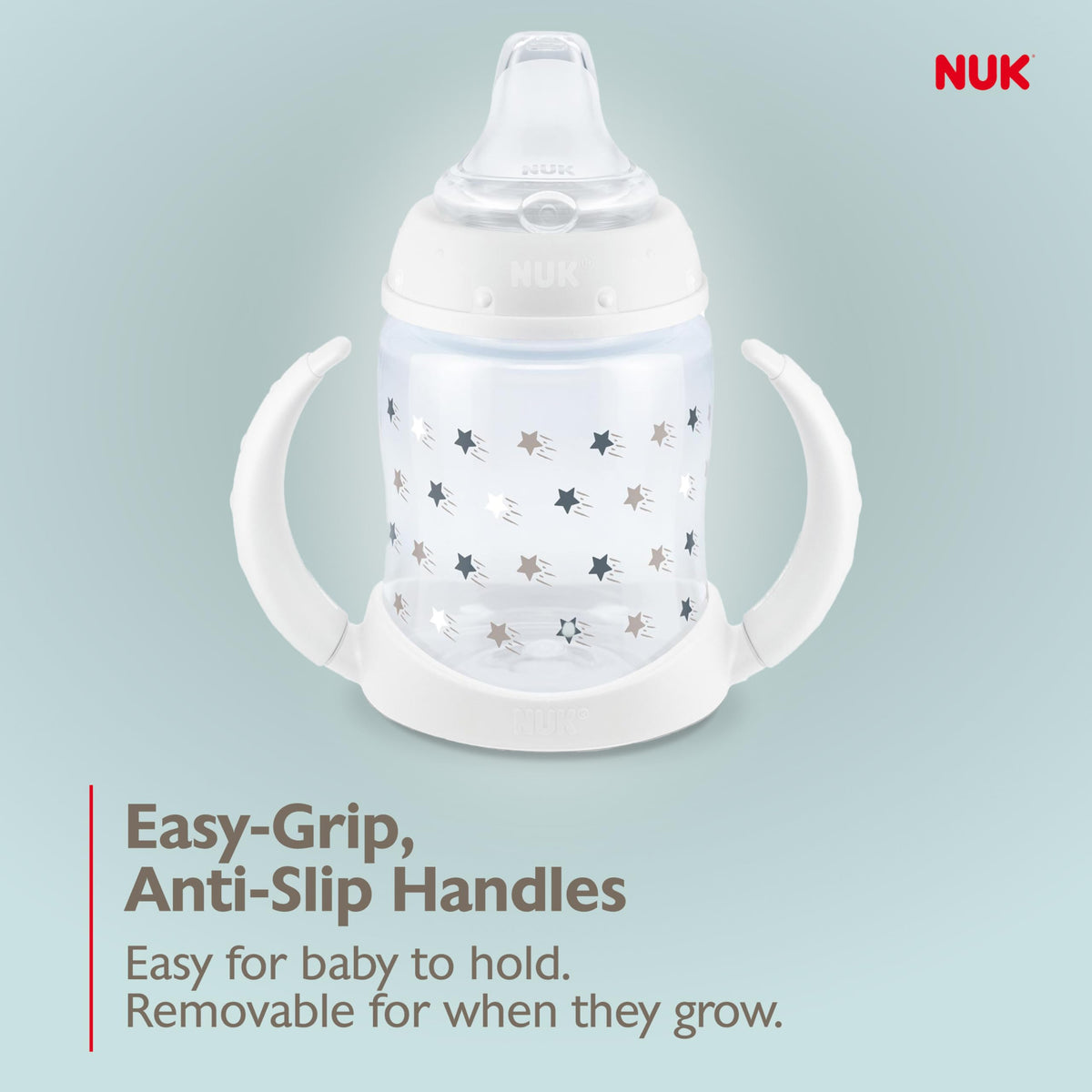 NUK premium infant sippy cup being held by a baby showing grip support