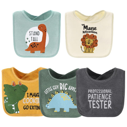 Toddler wearing The Peanutshell dinosaur print feeding bib