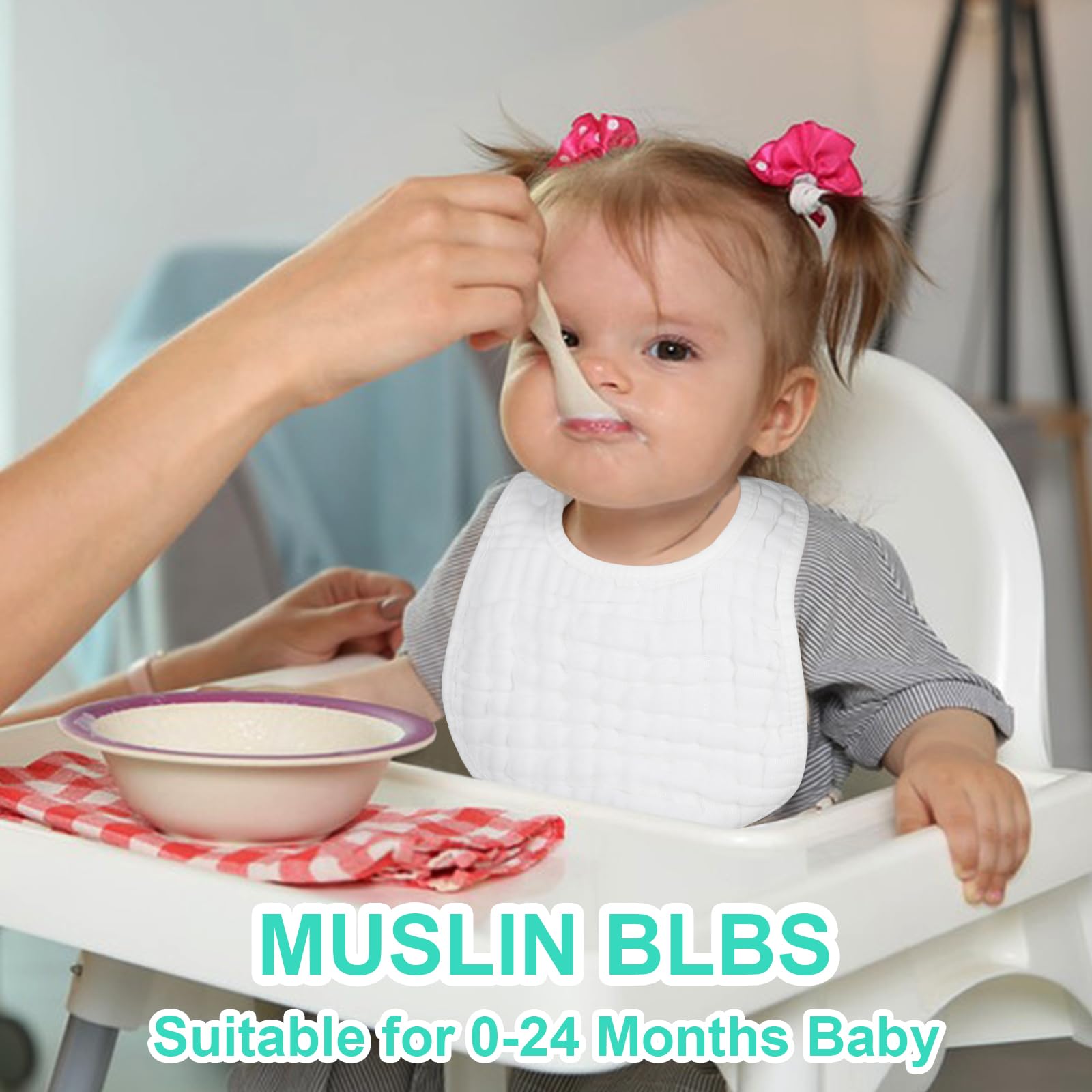 White muslin baby bibs with adjustable snap closure