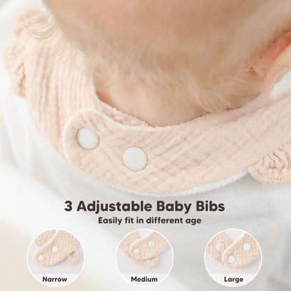 Newborn baby wearing a soft Bearmoss muslin drool bib