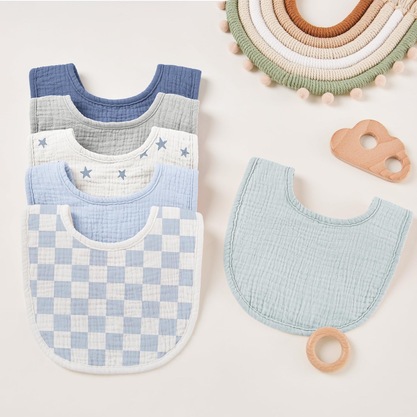 Gender neutral colors of Susurration baby bibs