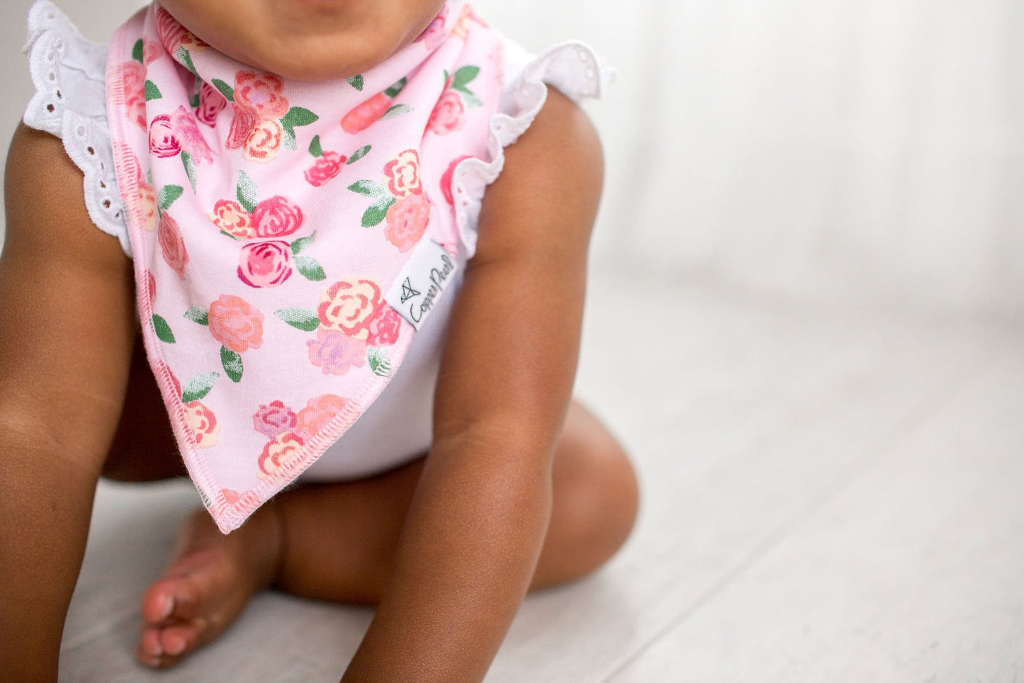 Adjustable nickel-free snaps on Copper Pearl bibs