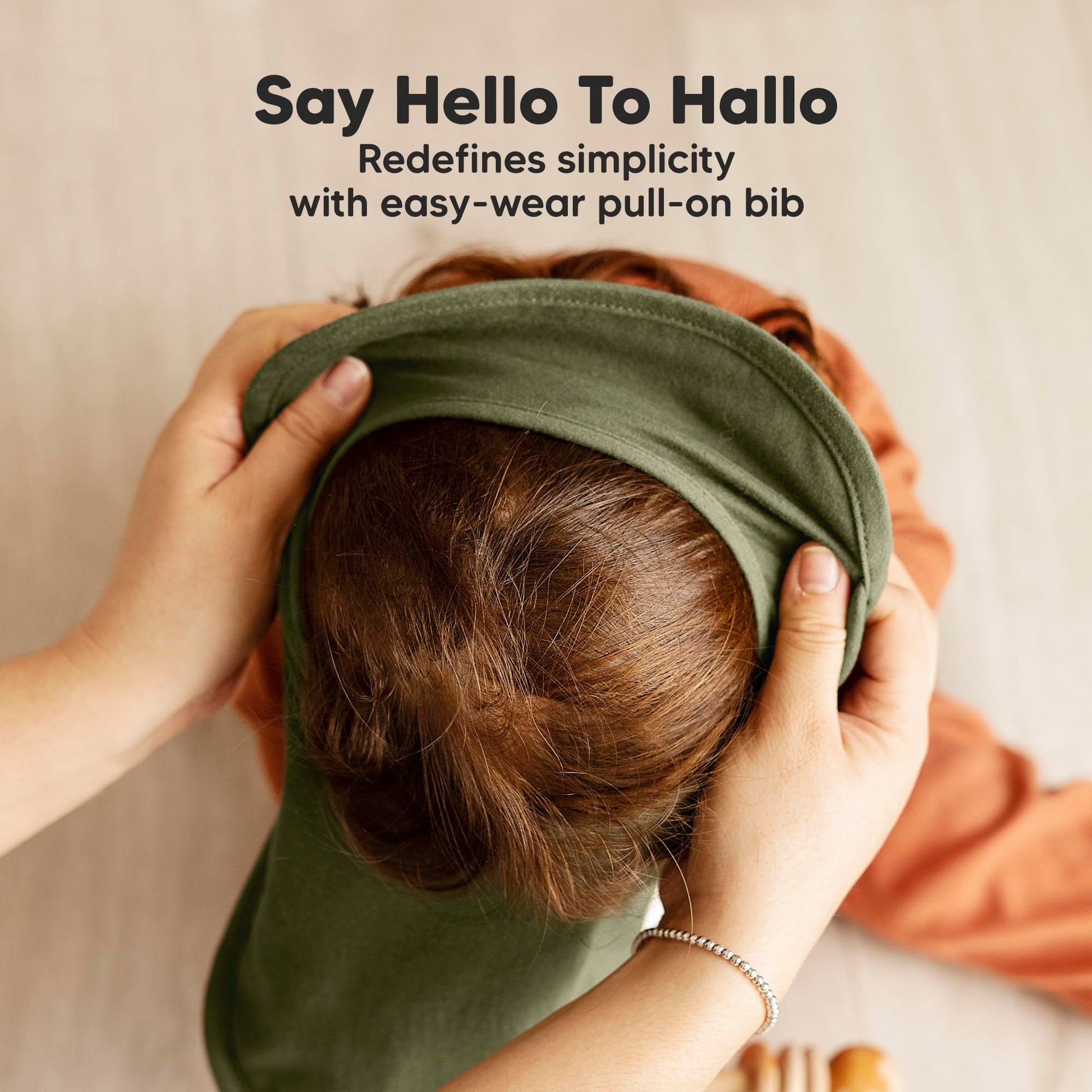 Side view of KeaBabies bib demonstrating lap shoulder design.