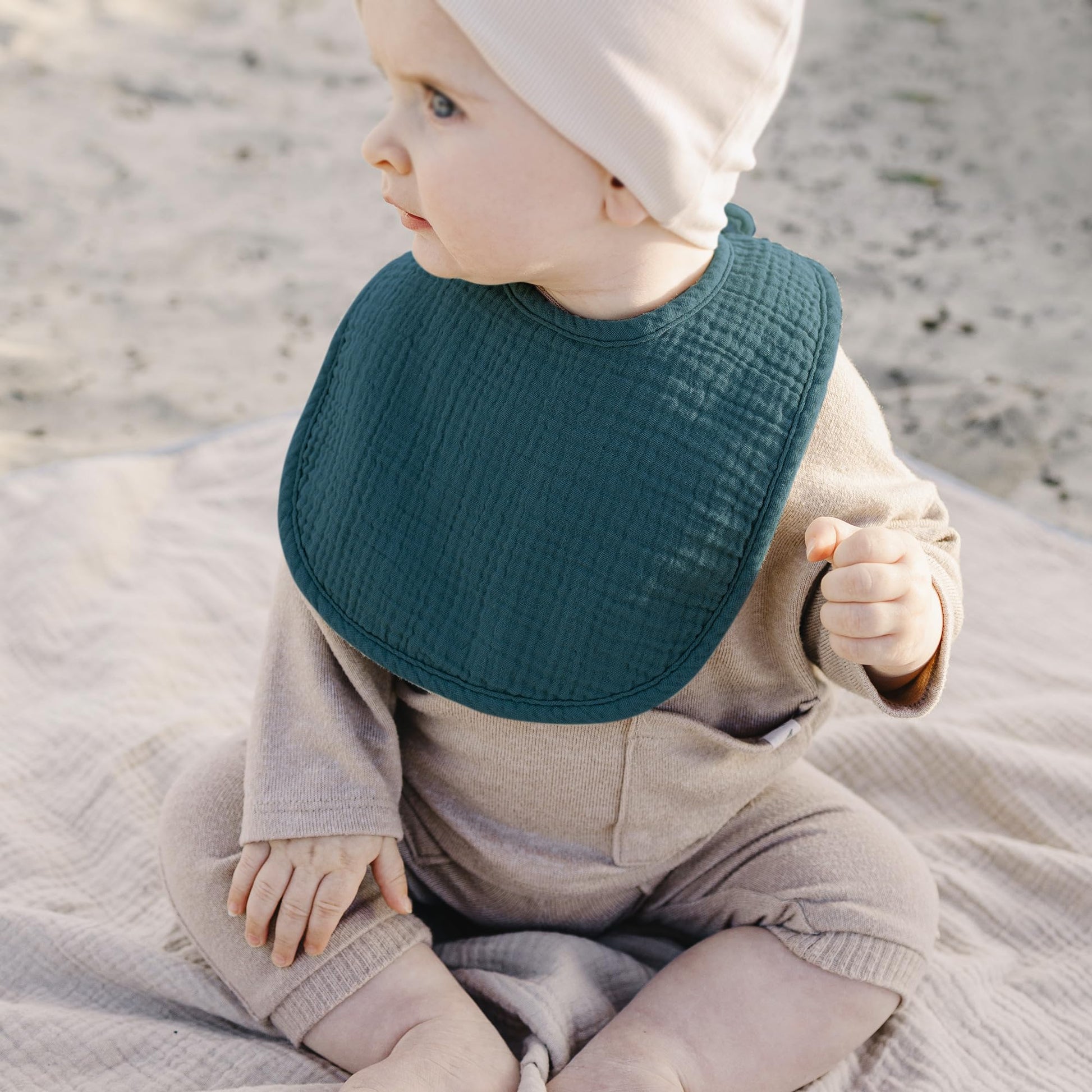 Detail view of nickel free snaps on Konssy bibs