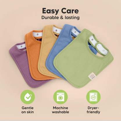 Child wearing KeaBabies absorbent organic bib for teething