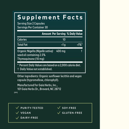 Cold pressed Nigella sativa supplement bottle on a clean background
