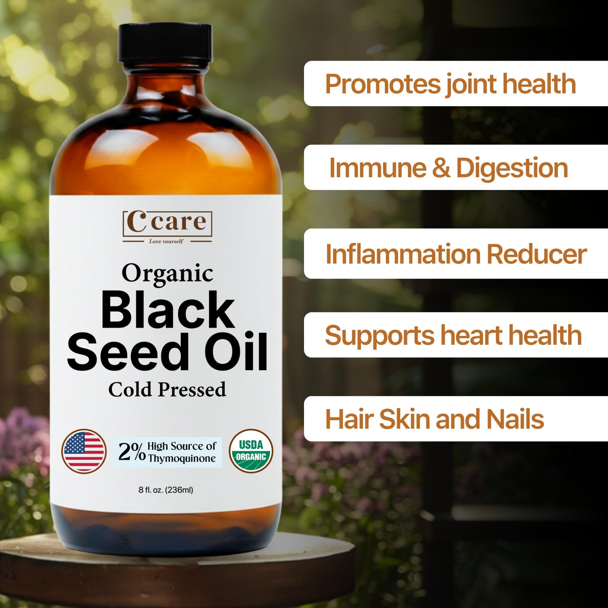 Side angle view of Vocks C Care eight ounce black seed oil highlighting the rich amber glass protection