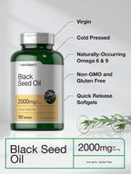 Close up of golden Nigella sativa liquid softgel capsules in a container