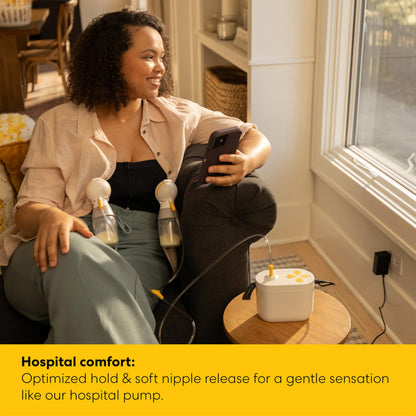 Close up of Medela breast pump collection bottles and tubes