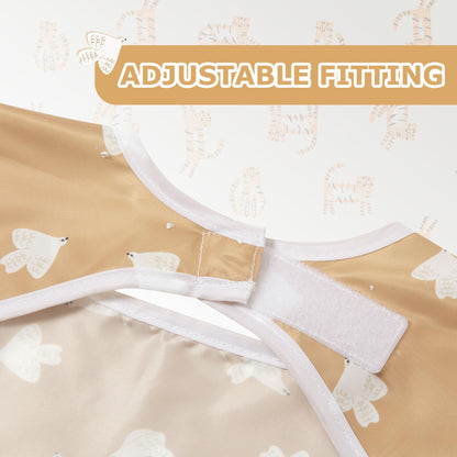 Little Dimsum long sleeve baby bib folded compactly into its pocket sized storage pouch.