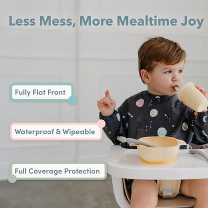 Loulou Lollipop full coverage baby feeding bib with long sleeves showing adjustable snap closures