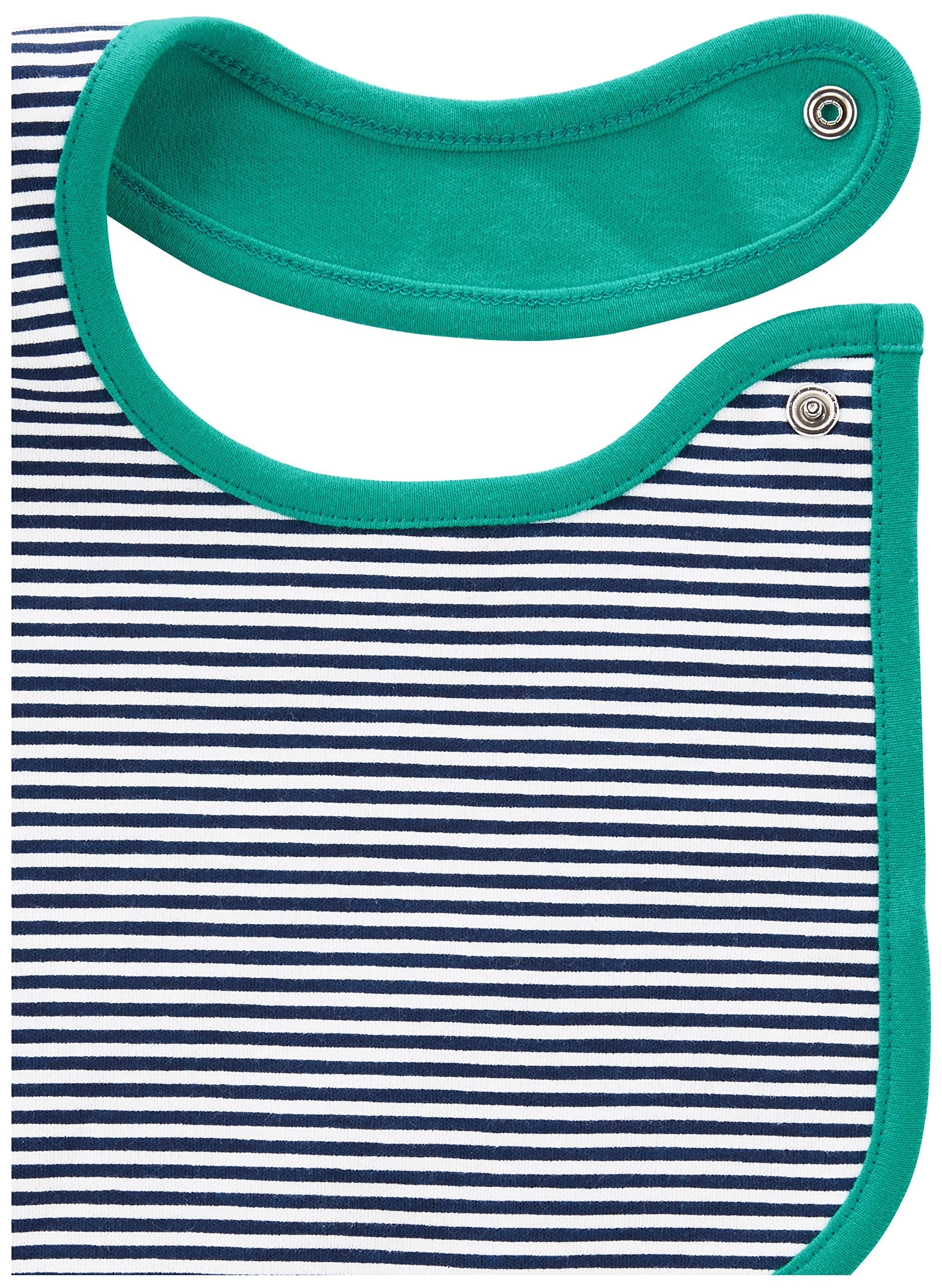 Close-up of the secure side snap button closure on a blue cotton teething bib