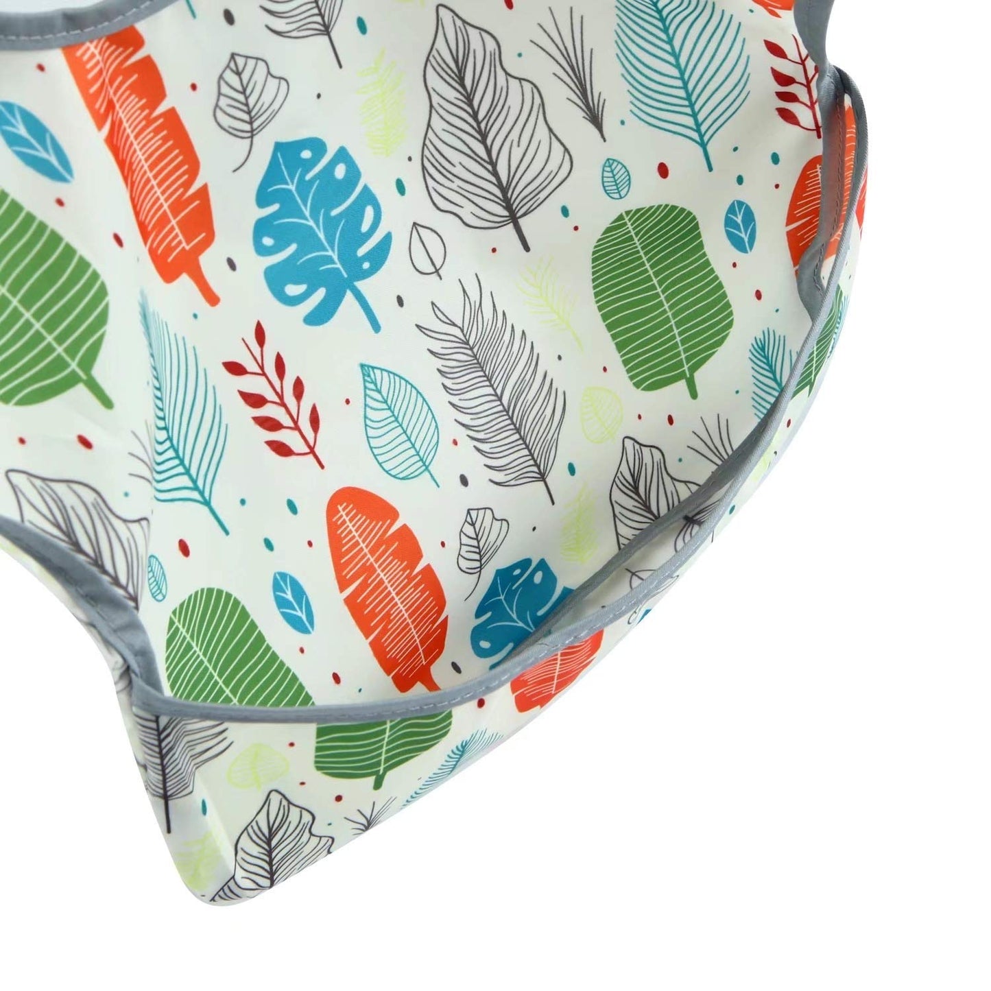 PandaEar washable baby bib being wiped clean to demonstrate stain and oil resistance.
