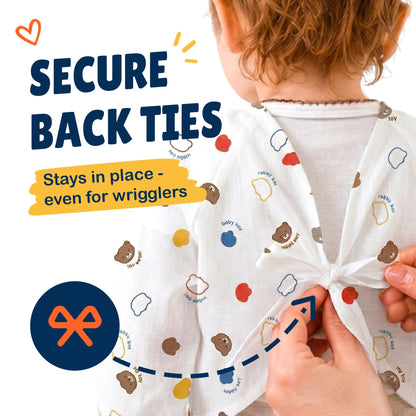 Individually packed travel ready disposable toddler bibs being pulled from a diaper bag