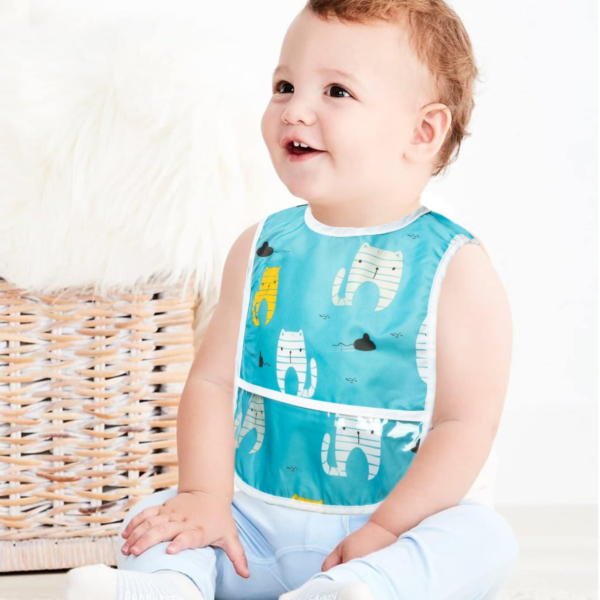 Water droplets pooling on the waterproof EVA front layer of a 2ooya teething bib demonstrating spill resistance