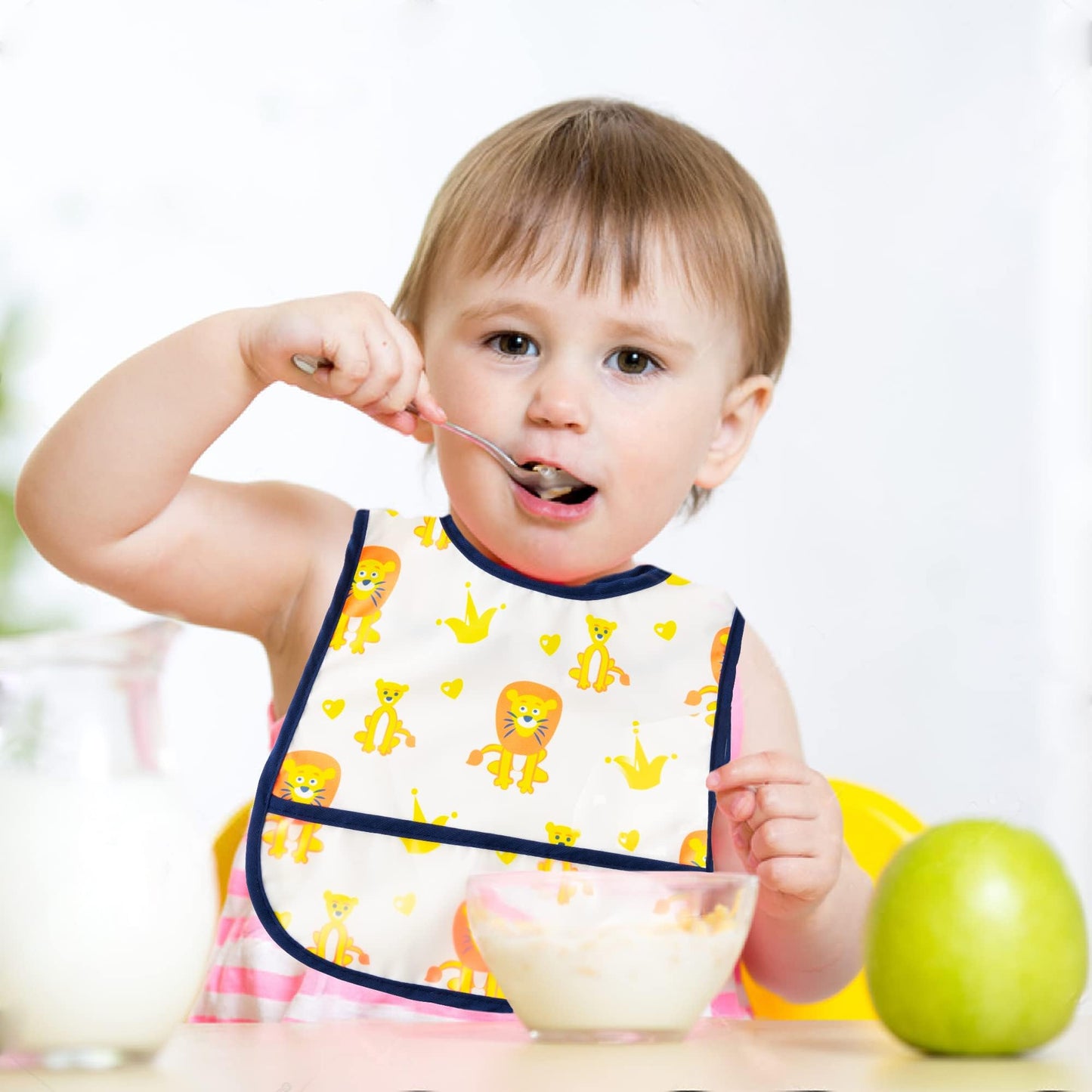 Six different 2ooya toddler bib patterns laid flat showing elephant lion zebra and unisex designs