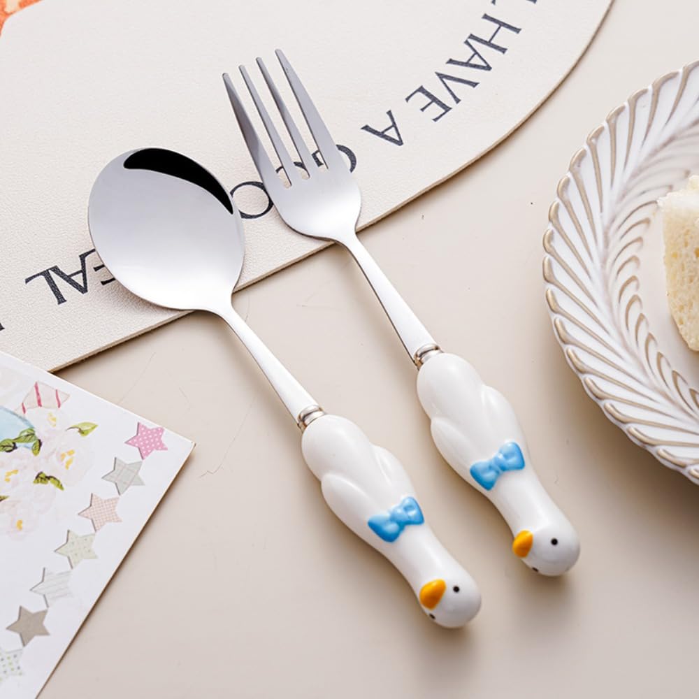 Side profile of cute duck ceramic handle cutlery set
