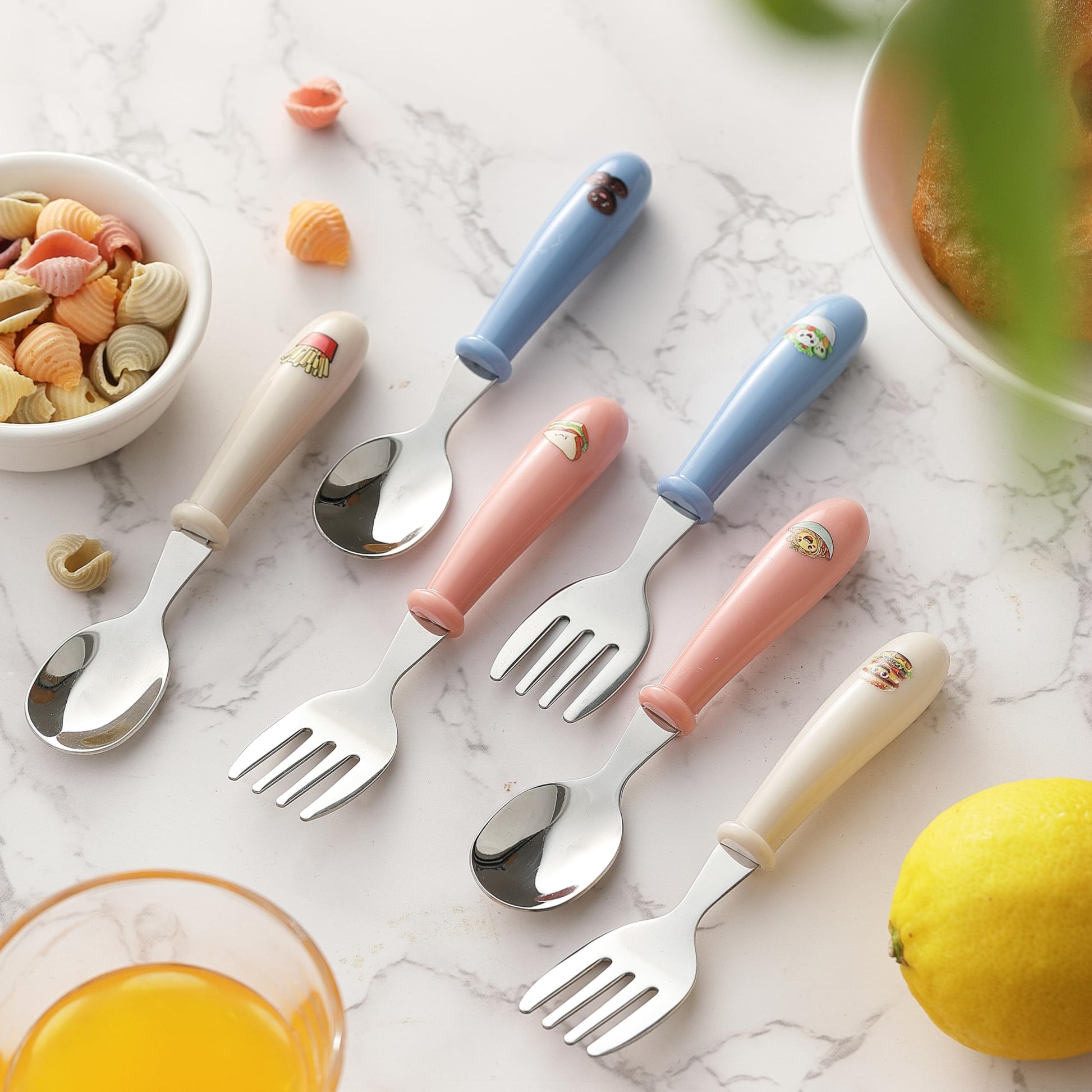 Detailed view of the durable food grade stainless steel construction on the MONGSEW child self feeding utensils