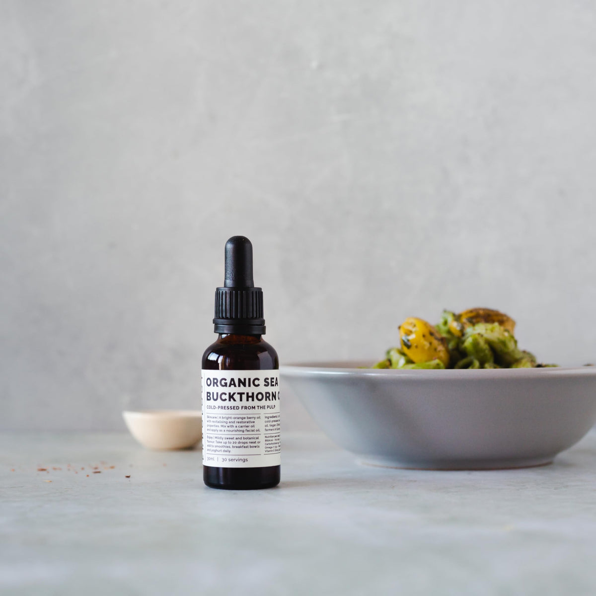 Erbology sea buckthorn oil liquid texture in glass drop