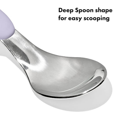 OXO Tot portable kids cutlery set in Lilac snapped securely inside the closed compact diaper bag case.
