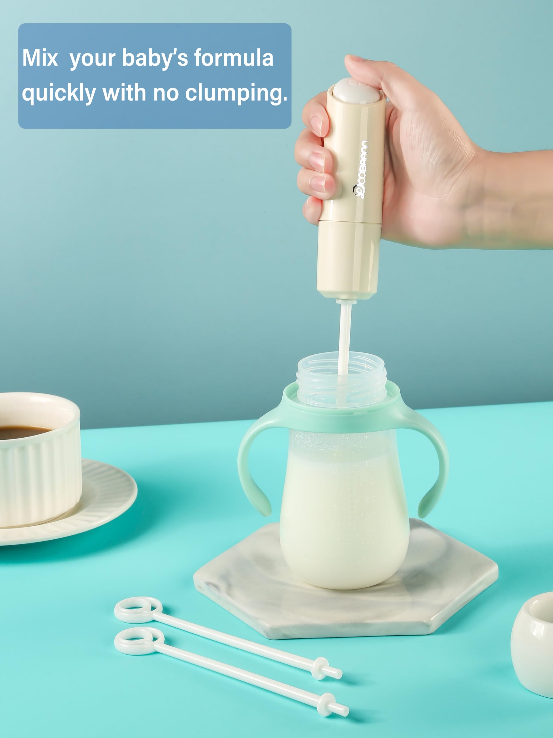 DOOBAANN handheld milk frother close-up showing the premium food-grade stainless steel blending wand.