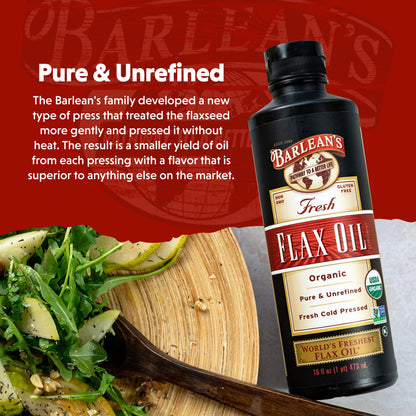 Pouring a tablespoon of organic unrefined flax oil from the dark amber protective bottle.