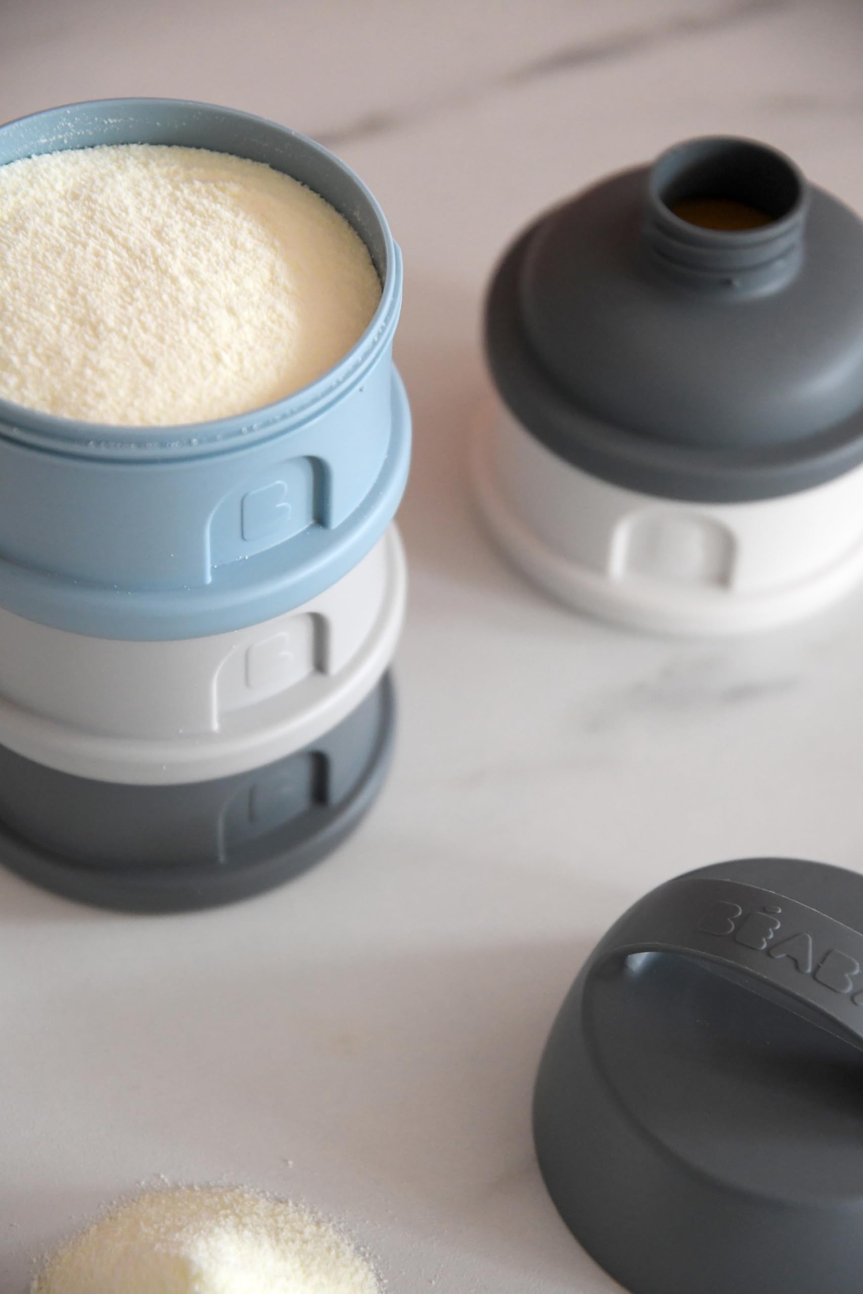 Béaba premium airtight baby container filled with toddler snacks for travel convenience.