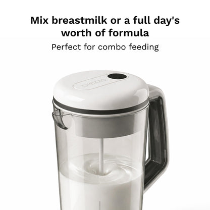 Baby Brezza automatic infant bottle mixing system with formula powder being smoothly blended by the motorized wand without air bubbles.