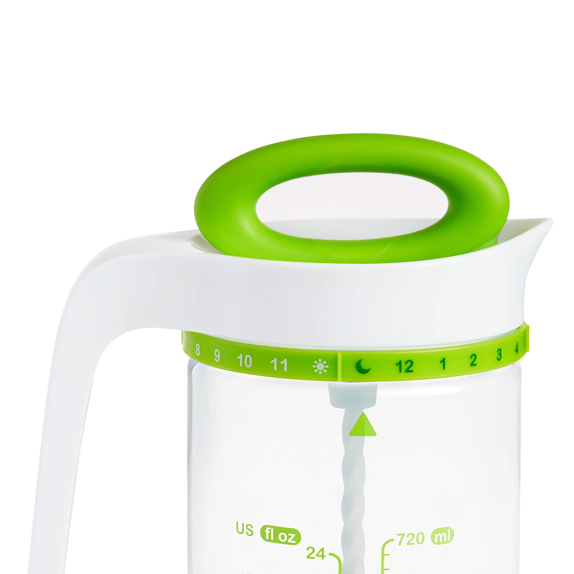 Munchkin formula mixing and storage pitcher for colic reduction placed next to infant feeding bottles.