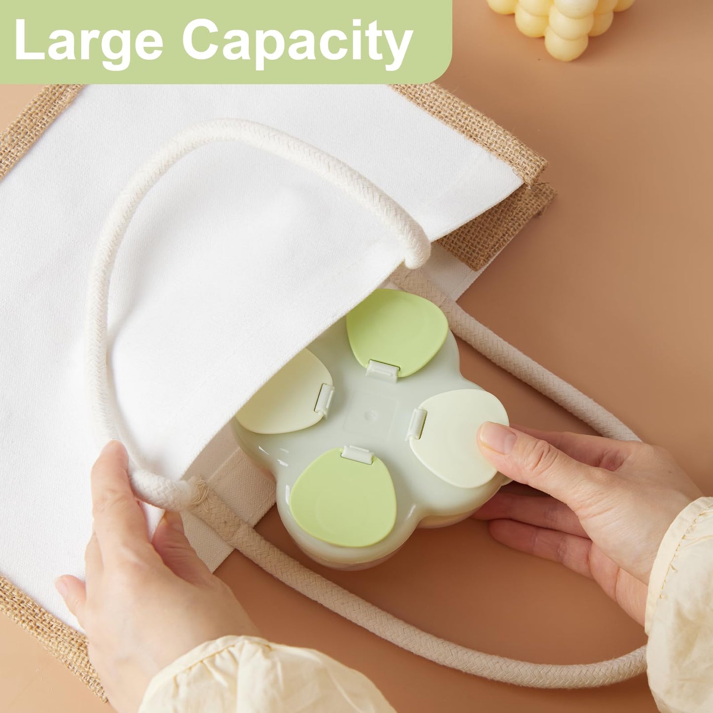 Top view of the four separate compartments inside the infant travel snack container.