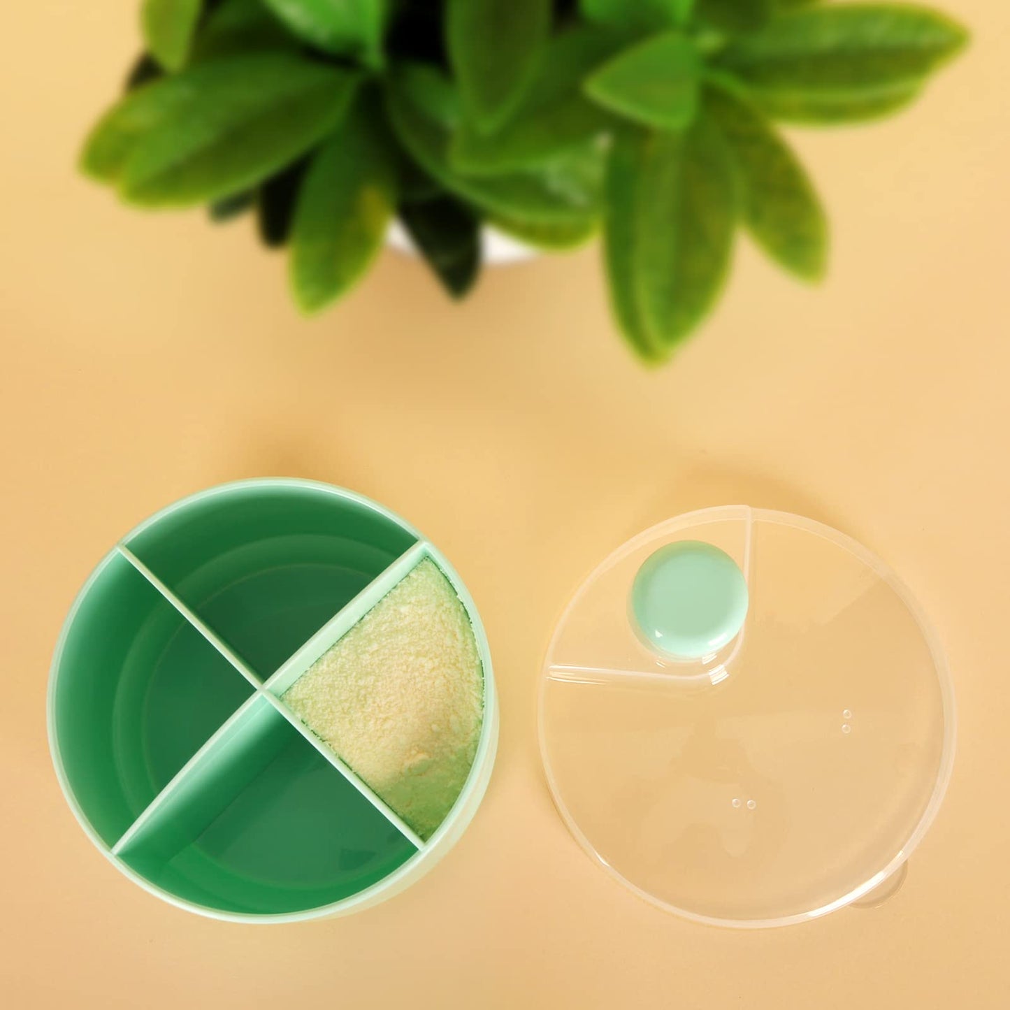 Accmor rotating snack container two pack set in green color for toddlers.