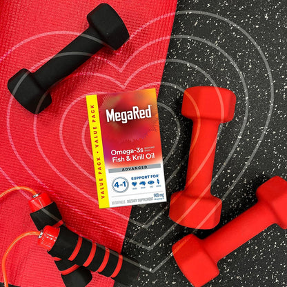 MegaRed 500mg Omega 3 supplement capsules poured on a flat surface demonstrating the compact size and clear purity of the softgel