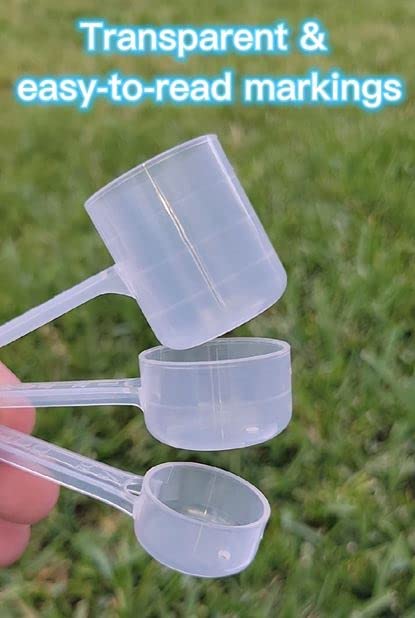 Babyola transparent baby milk powder measuring scoops showing clear markings