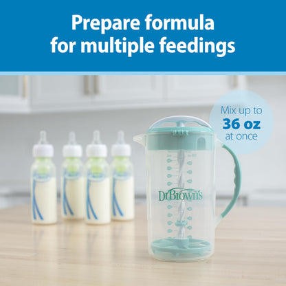 Gray Dr. Brown's baby pitcher with locked lid preventing leaks during formula preparation.