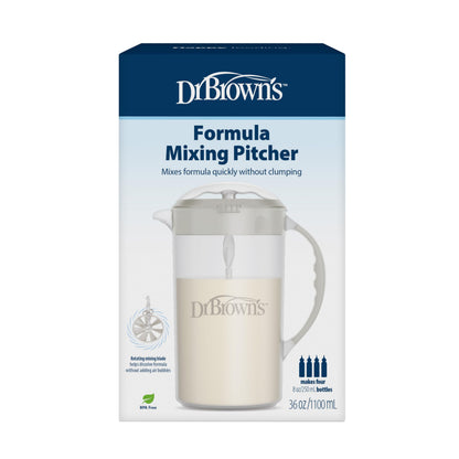 A parent pouring smooth formula from the gray Dr. Brown's pitcher into a narrow baby bottle.