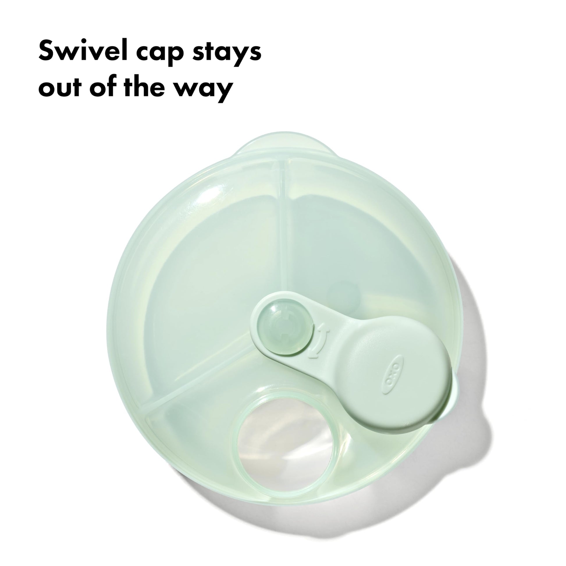 OXO Tot portable baby feeding storage cup packed inside a diaper bag.