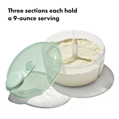 OXO Tot Opal formula container being poured one-handed into an infant bottle.