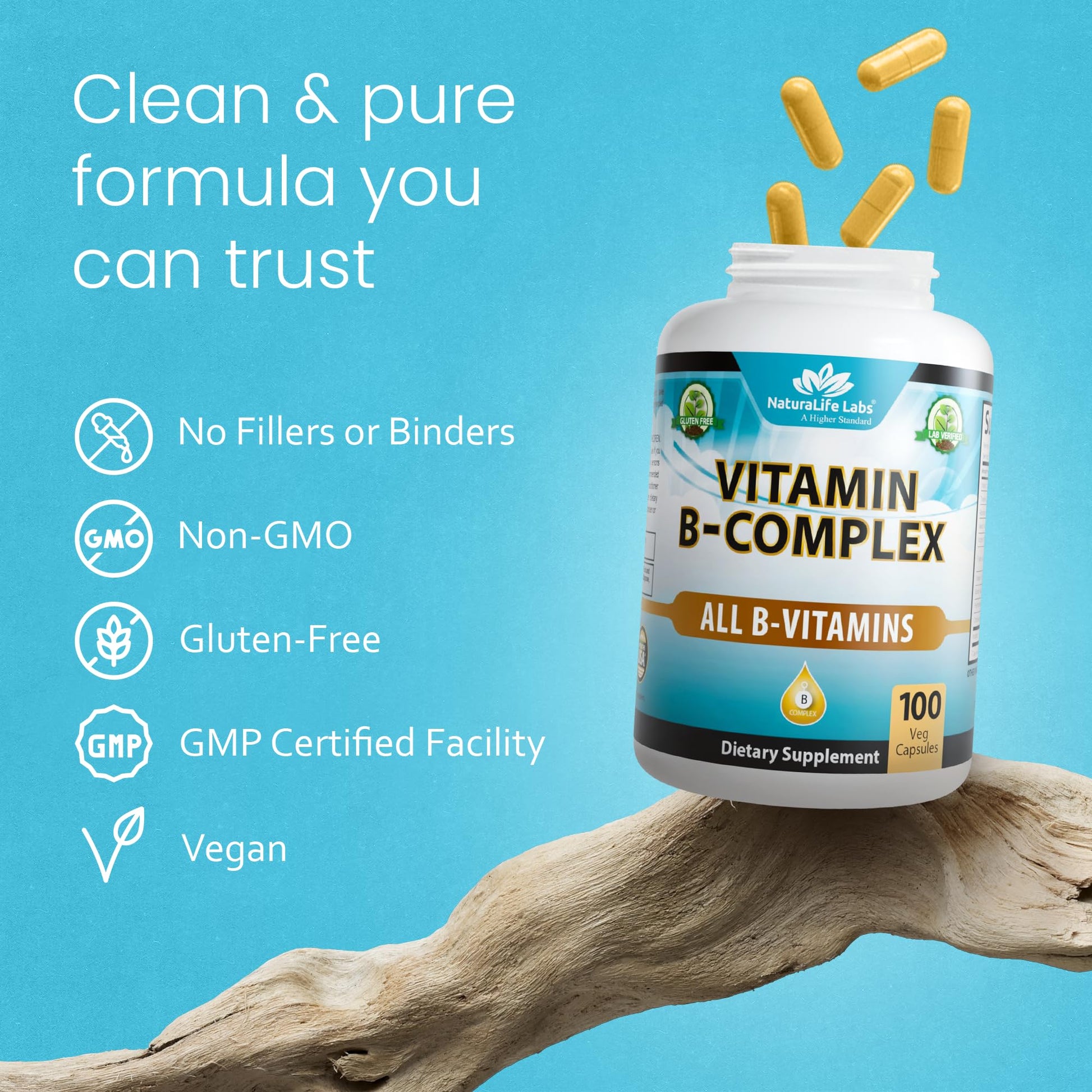 NaturaLife Labs B-Complex capsules displayed next to the product bottle demonstrating pill size