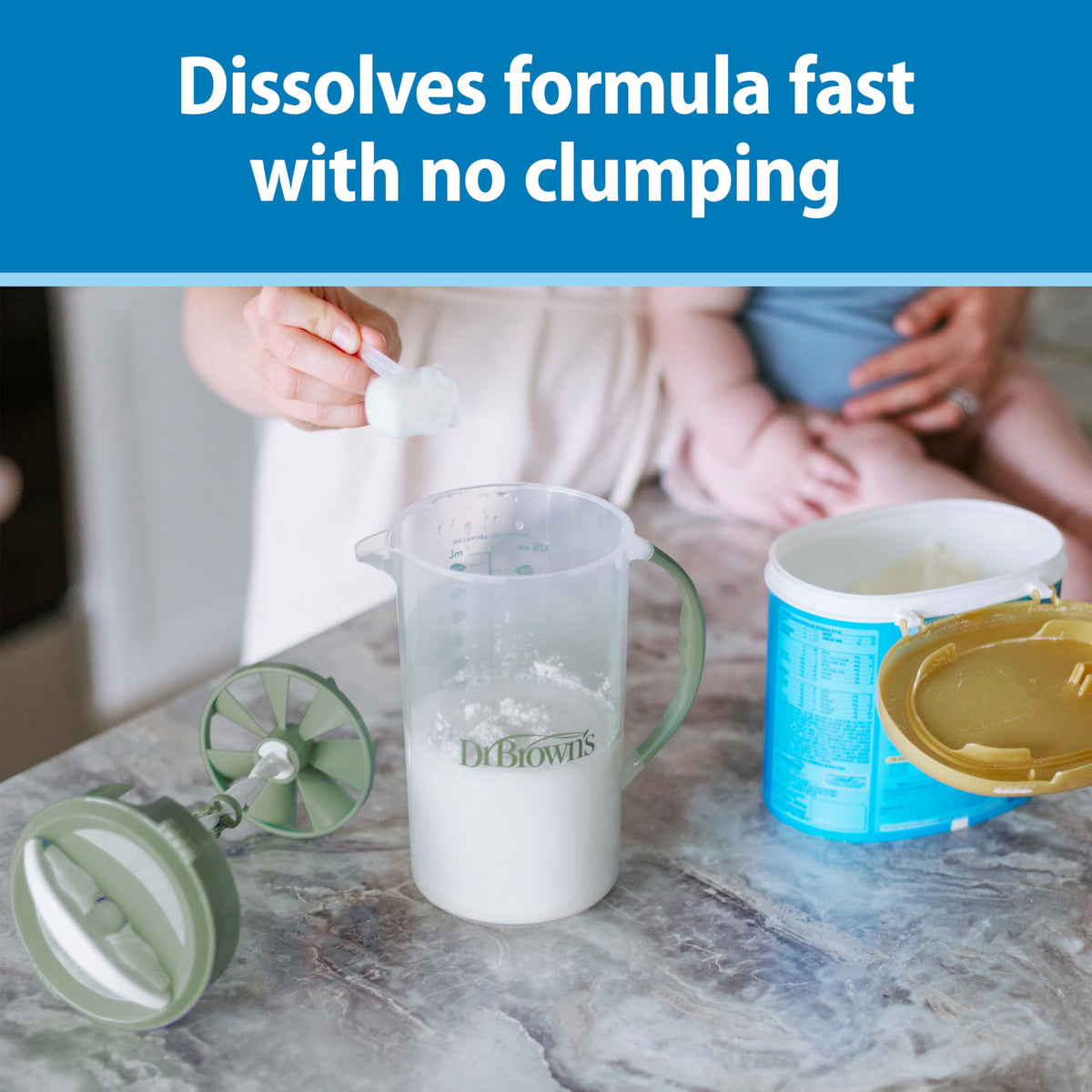 Dr. Brown's formula pitcher displaying the adjustable stopper and internal mixing blade assembly.