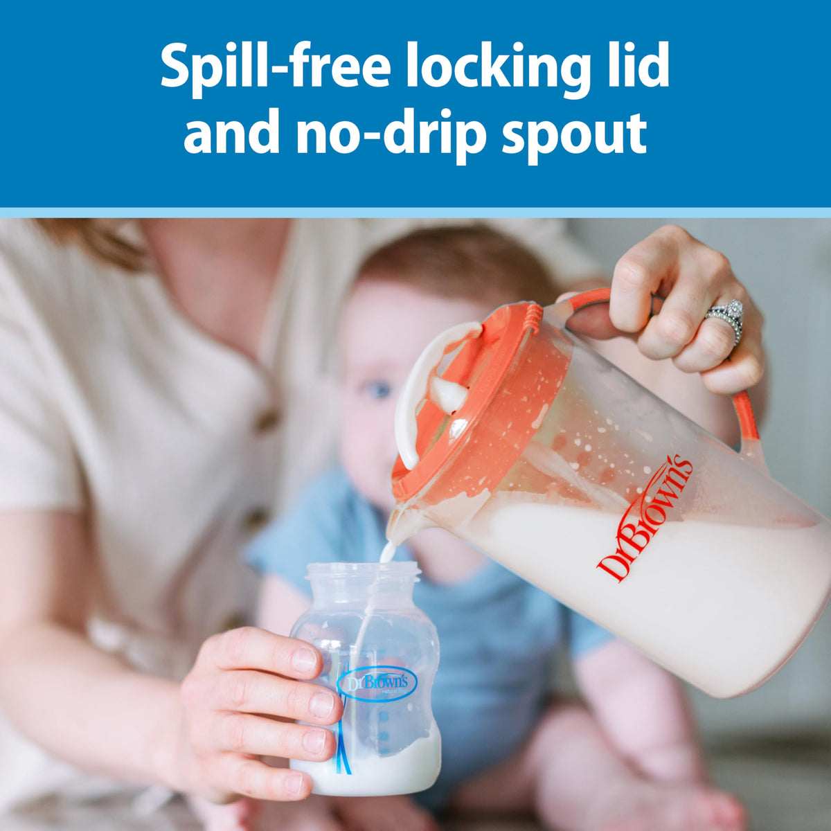 The black handle and lid design of the Dr. Brown's infant formula pitcher.