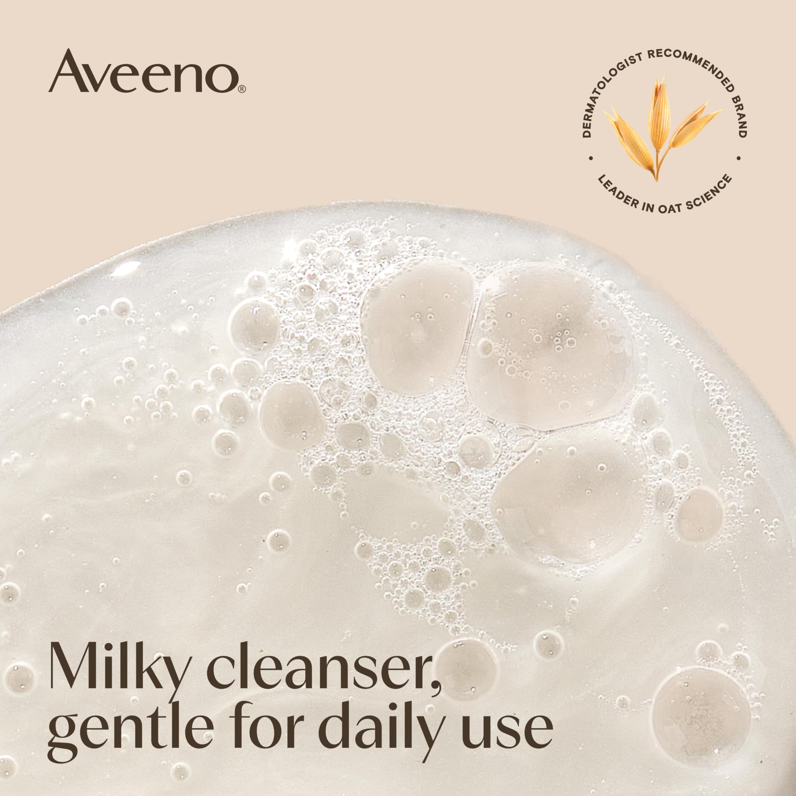 Texture shot of the milky non foaming gel consistency of Aveeno Nourishing Oat Cleanser