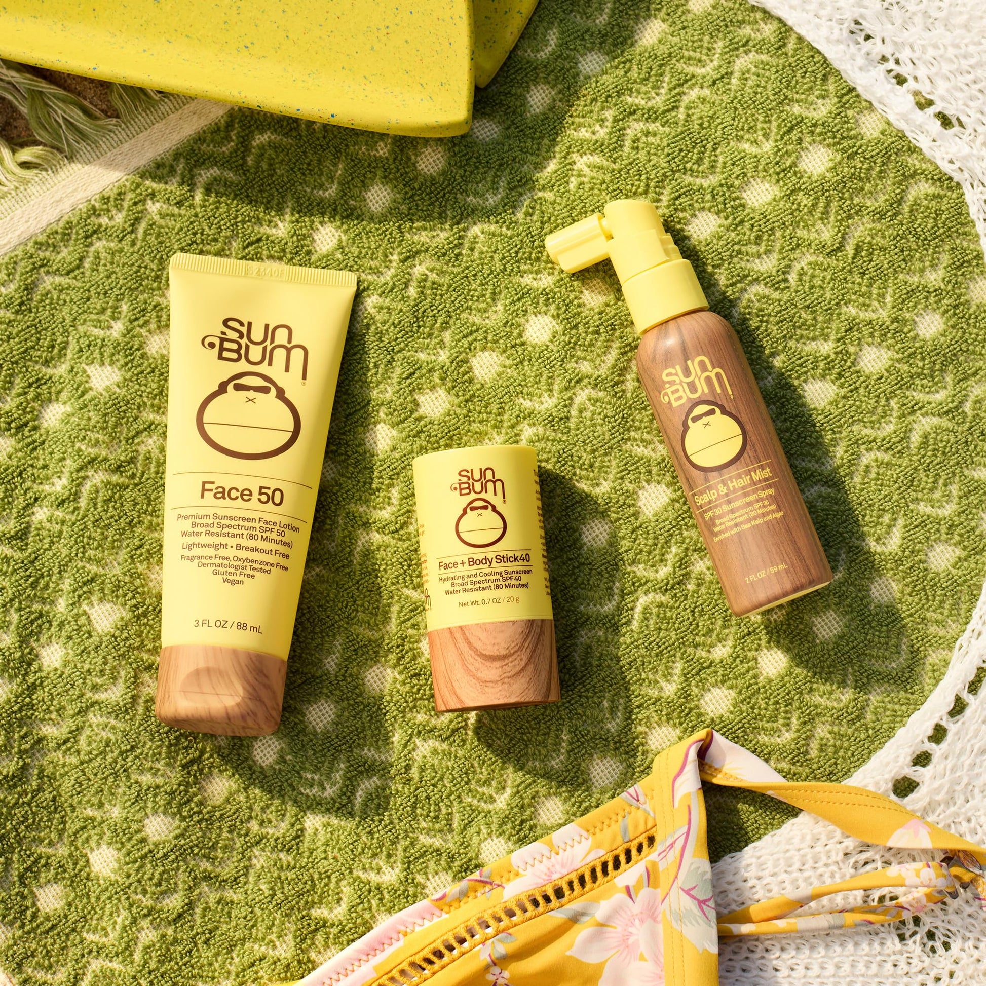 Sun Bum original scalp and hair protection bottle in lifestyle setting