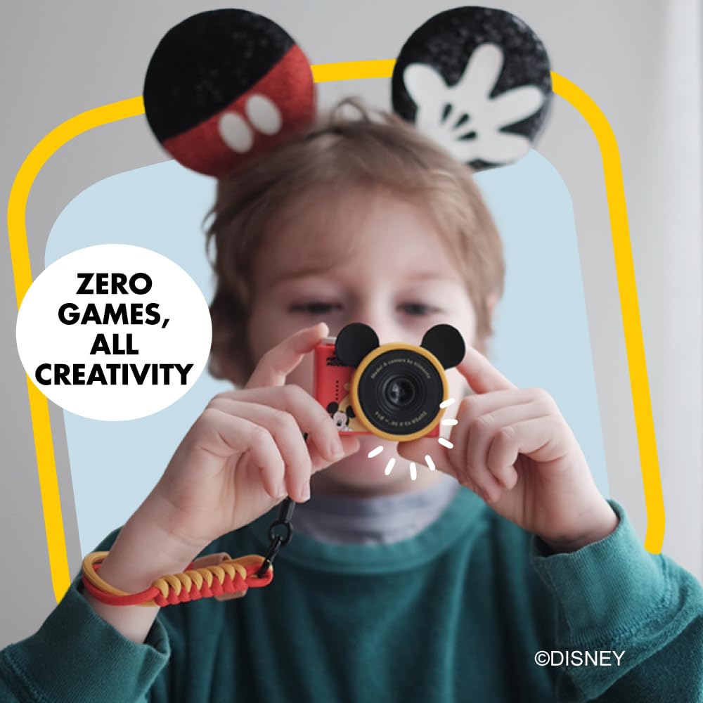 Kidamento kids mini travel camera demonstrating the front-facing lens for creative childhood photography