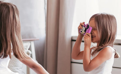 Minnie Mouse children camera package including the 512MB SD memory card and micro USB cable.
