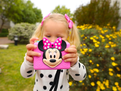 Close-up of the user interface on the eKids Minnie Mouse camera demonstrating the built-in photo frames.