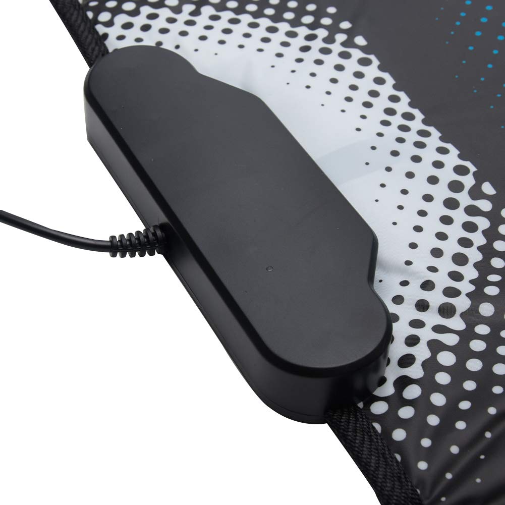 User playing dance game on PC with USB mat
