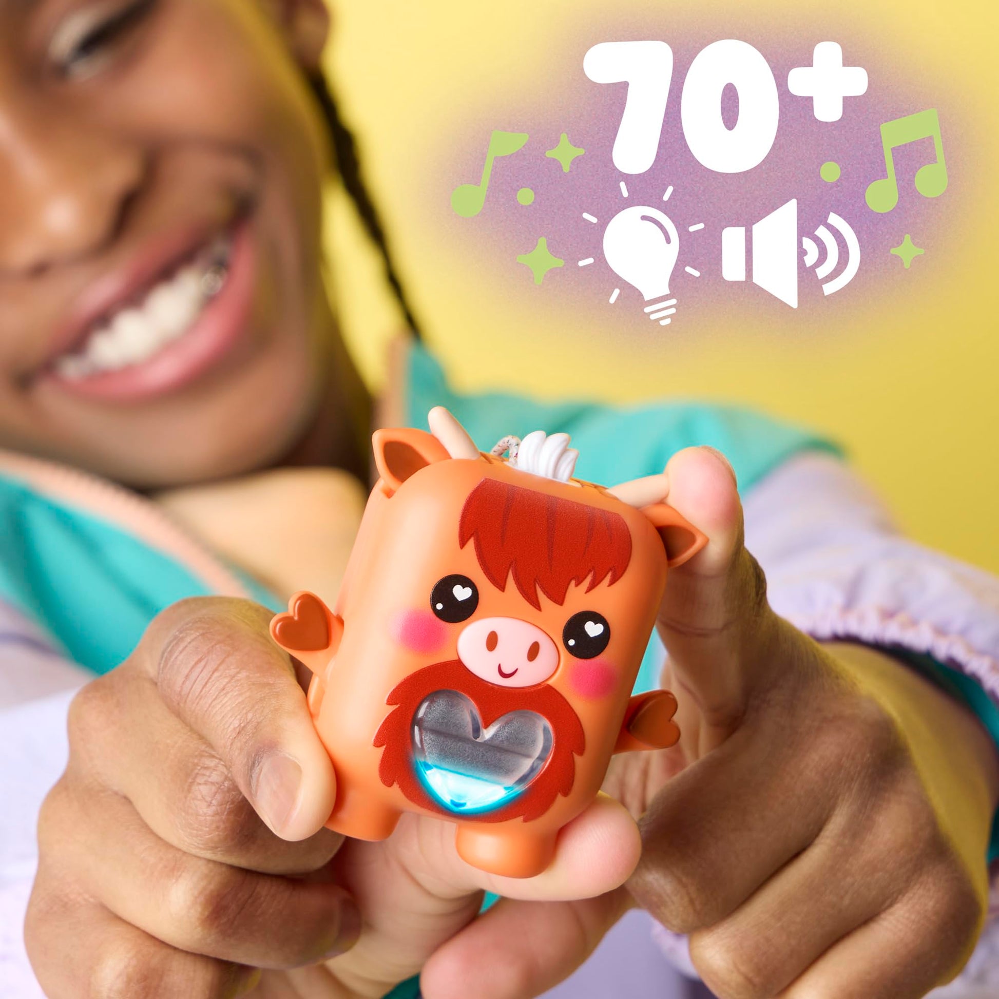 Hasbro electronic fidget toy cow displaying the interactive ear and mouth touch sensors